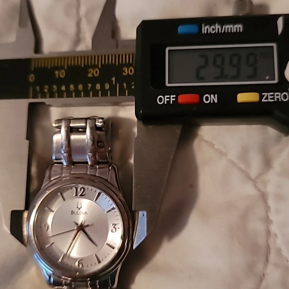 Bulova Ladies Watch 30mm Quartz Silver Dial Stainless Steel Band 96L005‎